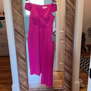 Bright pink formal low shoulder Eliza J dress.